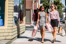 Two women shopping on Spring Garden Road near Clyde House Halifax